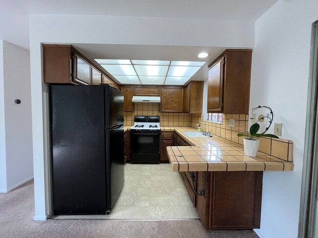 Photo - Pet friendly 2+1 w/private yard + in-unit laundry!