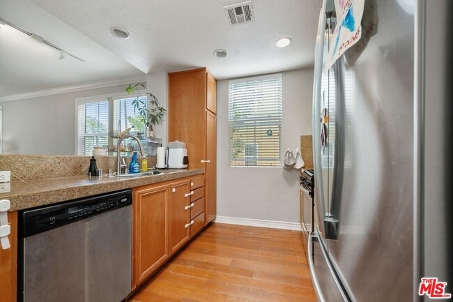 Photo - 12963 W Runway Rd Unit 104