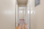 HALL WAY LEADING TO BATHROOM, LINEN CLOSET AND MASTER AND THIRD BEDROO. SMOKE DETECTOR/CARBON MONOXI - 9226 Palm St Unit B