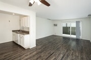2BR, 1BA - 850SF - Living Room and Kitchen - Lincoln-Moody Apartments