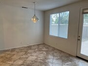 Photo - Los Arboles town-home with a Driveway