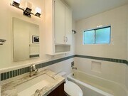 Photo - Spacious One Bedroom + Den Backhouse! In Unit Laundry! Prime Location!