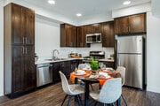 YOLO East dining table and kitchen with appliances - The Harrington
