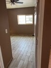 Photo - LARGE Lot - Nearly half acre.  Perfect for animals or gardening.  Updated interior, New Gas Range...