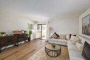 1BR, 1BA - 700SF - Living Room - Creekside Meadows