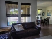 Living room/dining area on first floor - 63 Finch Townhome