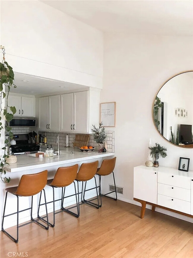 Photo - Coastal-Chic 1BR with In-Unit Laundry, Central A/C, and All Utilities Included — Steps to Hunting... Unit 202