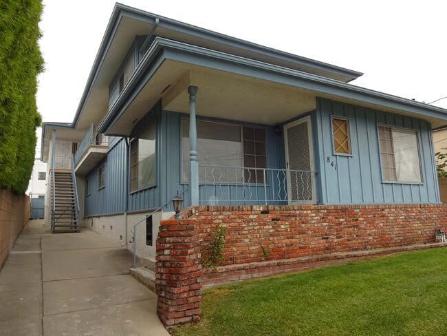 Building Photo - 841 W 25th St Unit 2