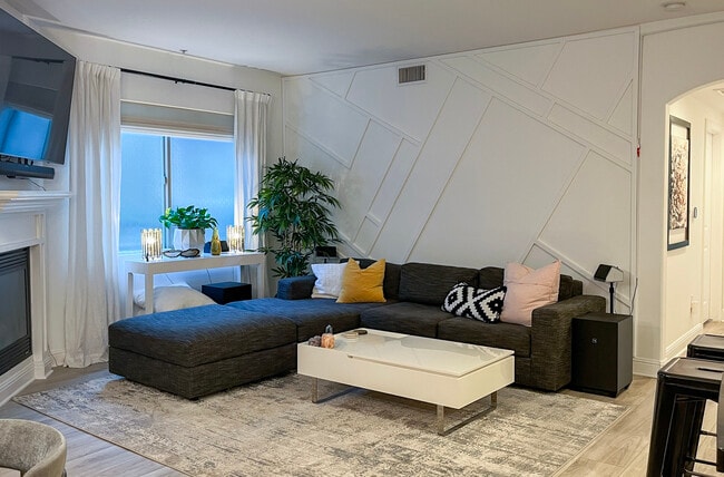 extra long sofa allows for ultimage lounging - 5037 Rosewood Ave Unit 101