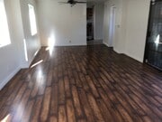 Separate dining area with brand new ceiling fan. - 806 E 65th St House