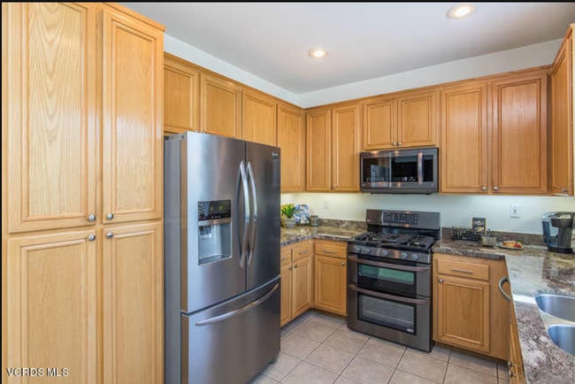 Before cabinets painted - 530 Bannister Way