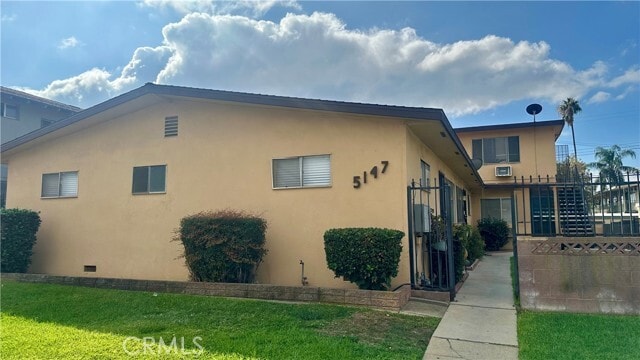 Building Photo - 5147 Canoga St Unit A