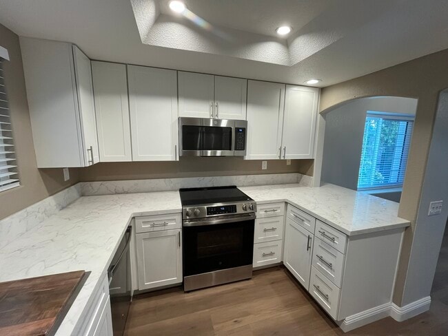 Brand new kitchen with custom soft close built-ins; LOTS of cabinet space - 16274 Avenida Venusto Unit E