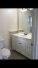 Bathroom vanity - 12420 Oxnard St Apartments Unit Studio