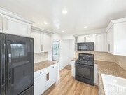 Photo - Bright 3BD/2BA Single-Family Home in La Mesa with Large Yard, In-Unit Laundry & Spacious Garage