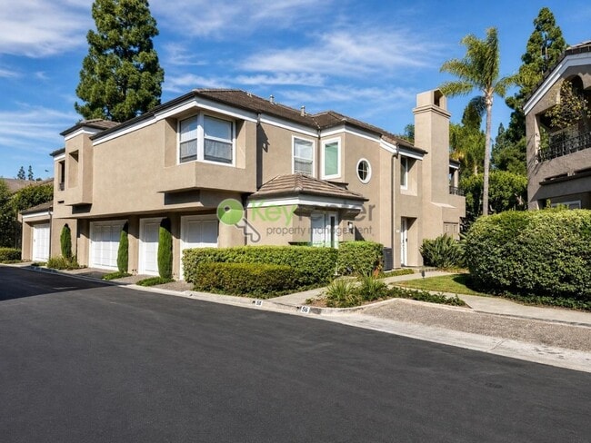 Photo - Beautifully renovated single-level condo in gated Newport Baycrest