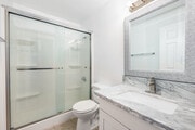 2BR, 2BA - 1150SF - Primary Bathroom - Allen Court Apartments