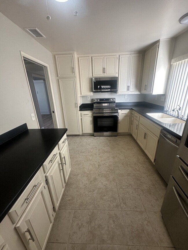 Photo - $3,200 - Charming Ground-Floor 2 Bed / 2 Bath Condo in Desirable Oaks North 55+ Community