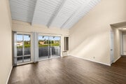 2BR, 2BA - 975SF - Living room - The Village at Granada Hills