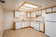 2BR, 1.5BA - 868SF - Kitchen - Desert Breeze Apartments