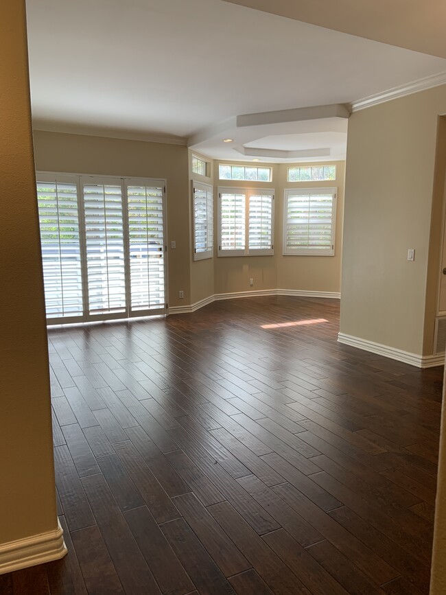 Real hardwood floors throughout unit - 14415 Benefit St Unit 102
