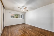 2BR, 2BA - 950SF - Primary Bedroom - Holiday Manor
