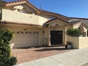 lemon tree in front of doors - 1304 Mackay Ln