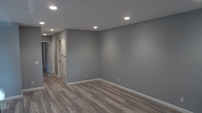 Photo - REMODELED 2BR; 1BA end unit condo w/ 1 car garage & 1 parking space Unit B