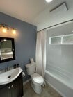 New bathroom with soaking tub and new white subway tile - 1755 Mission Cliff Dr Unit 1753