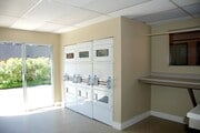 Laundry Facility at Villa Pacific Apartments in Oceanside, California. - Villa Pacific Apartments