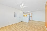 2BR, 2BA - 926SF - Living Room and Dining Room - La Mirage Apartments
