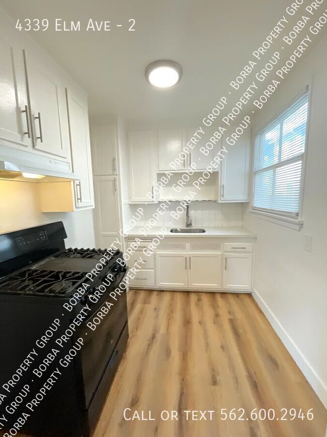 Building Photo - 4339 Elm Ave Unit 2