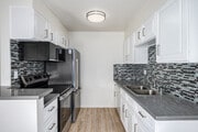 2BR, 2BA - 1000SF - Kitchen - Harmony Court Apartments