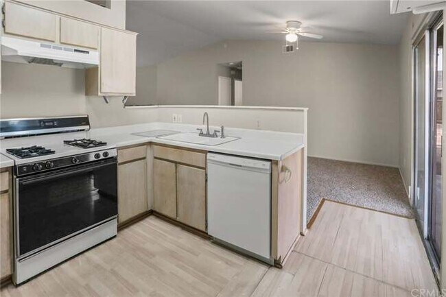 Updated Cabinets not in picture. - 14258 Tonikan Rd