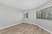 Retreat to a bedroom built for relaxation. - Creekside Alta Loma