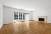 2BD, 2.5BA - 1,550SF - Living Room - Camden Drive Apartments