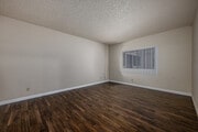 3BR, 2BA - 1400SF - Primary Bedroom - Belmont Plaza Apartment