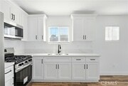 Photo - 523 W 78th St Townhome