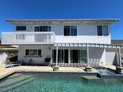 Photo - Coastal Elegance Meets Family Comfort in D... House