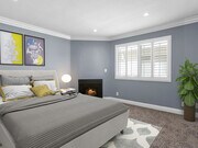 Brightly lit upstairs bedroom with new carpeting. - Hi Point Townhomes