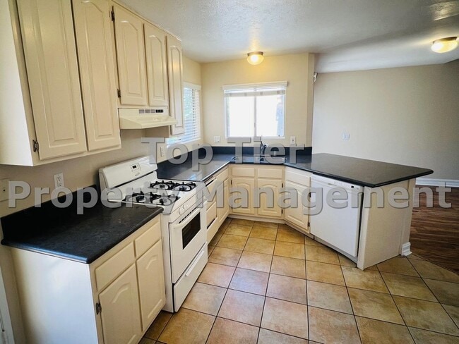 Photo - Charming 2-Bedroom Home with Large Yard and Modern Upgrades - Available Now!