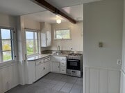 lots of kitchen cabinets - 8252 Rees St Apartment Unit Spanish Cottage