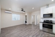 2BR, 1BA - 925SF - Kitchen/ Living Room - Parkway Plaza Apartments