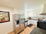 Photo - Unfurnished 4 bedroom/2 bathroom home with...