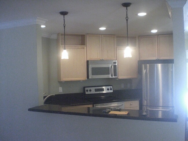 Building Photo - 7425 Charmant Dr Unit 2909