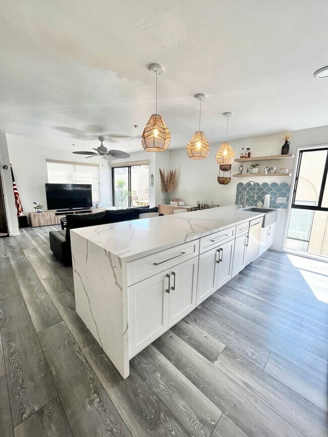 Photo - Live in Luxury Right on the Bay! Assigned Parking! Peek A Boo Bay View!