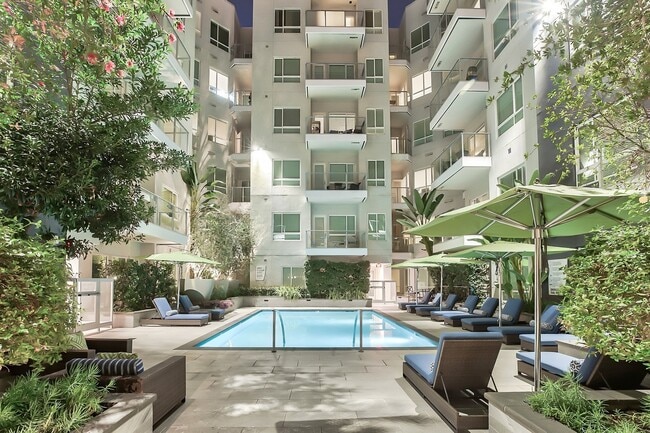 Our outdoor pool offers a quiet retreat from the city - Olympic by Windsor