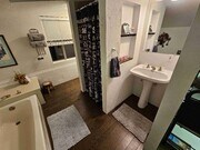 Photo - 37711 E Benton Rd Unit Master Bedroom and shared kitchen