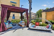 Poolside shaded cabana lounge seating - AMLI Camarillo
