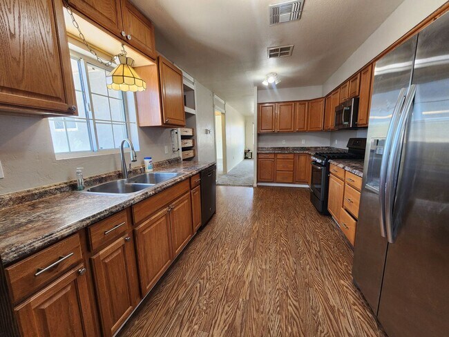 Building Photo - 3 Bedroom 2 Bath w/ Solar Rental